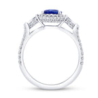 18K White Gold Three Stone Oval Blue Sapphire, Tapered Baguette and Round Diamond Ring